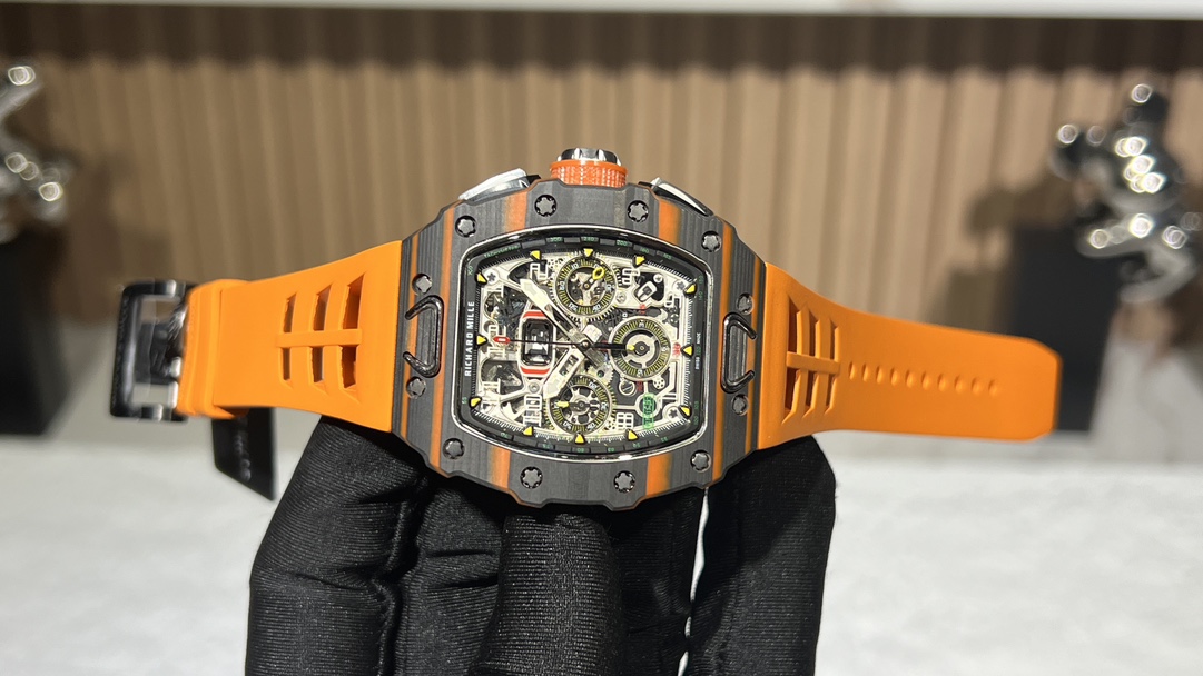 Swiss Replica Richard Mille RM 11-03 McLaren Watch – Carbon Fiber Skeleton Chronograph with Striking Orange Rubber Strap