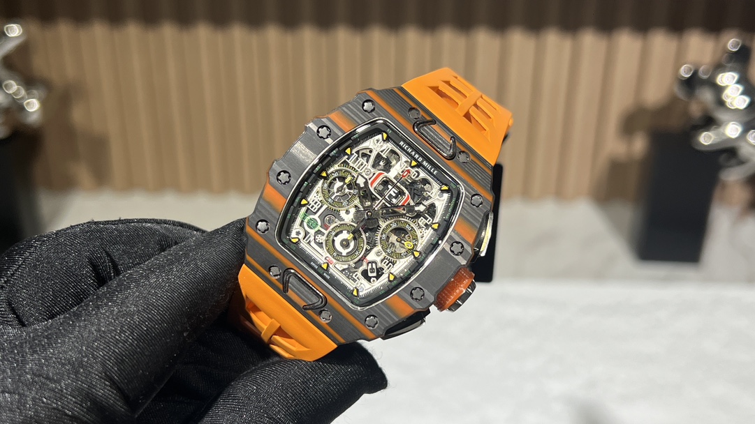 Swiss Replica Richard Mille RM 11-03 McLaren Watch – Carbon Fiber Skeleton Chronograph with Striking Orange Rubber Strap